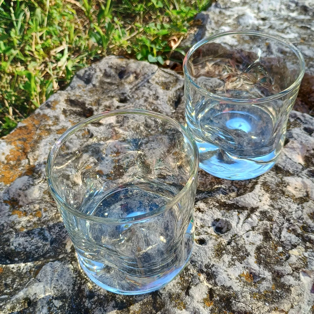 Set of two (2) mid-century, thick based warbled or dimpled whiskey glasses